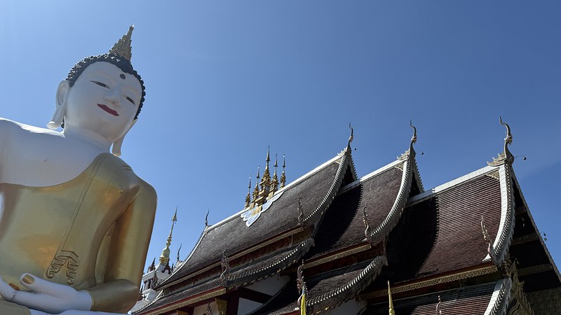 A giant Buddha sitting next to Wat Rajamontean in Chiang Mai